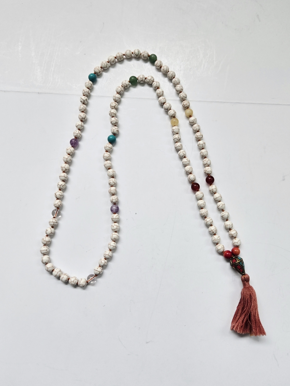 Hand-knotted Mala necklace made from natural stones such as white howlite.